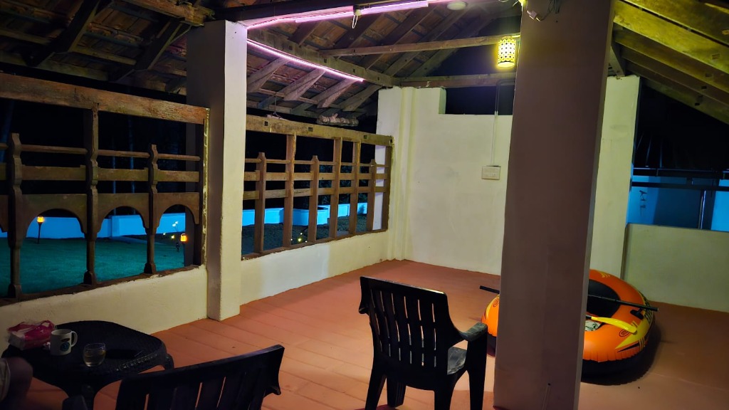 A soothing nighttime view of the semi-open porch